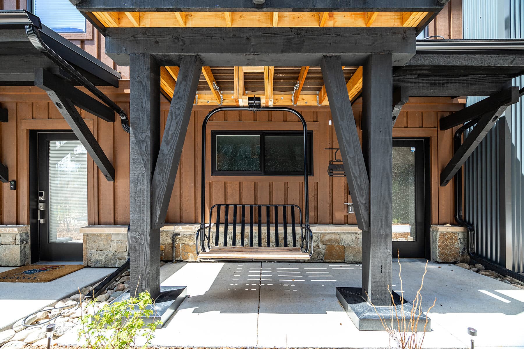 Covered timber entrance to the Après Haus townhome in Silverthorne