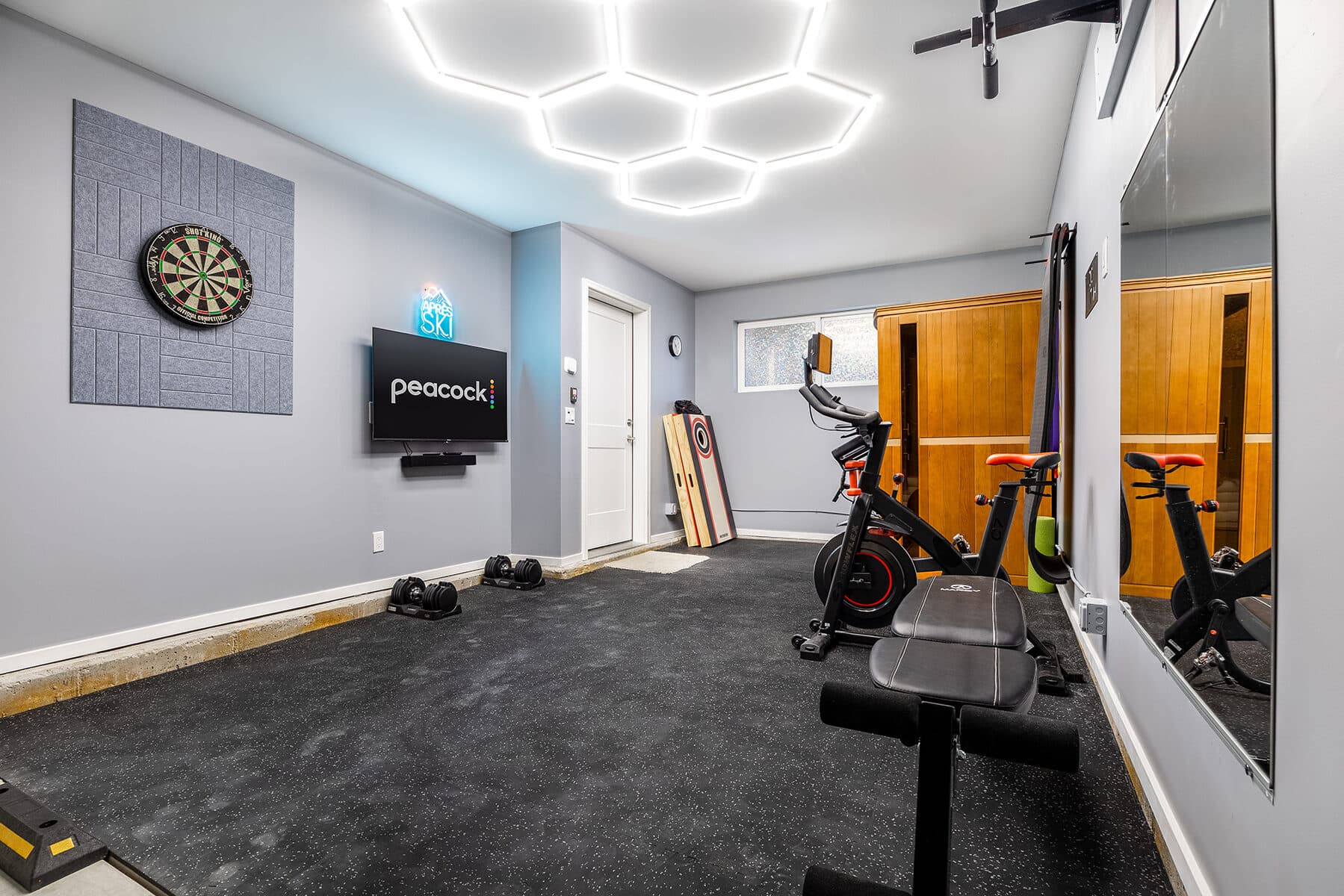 Home gym with cardio and strength equipment